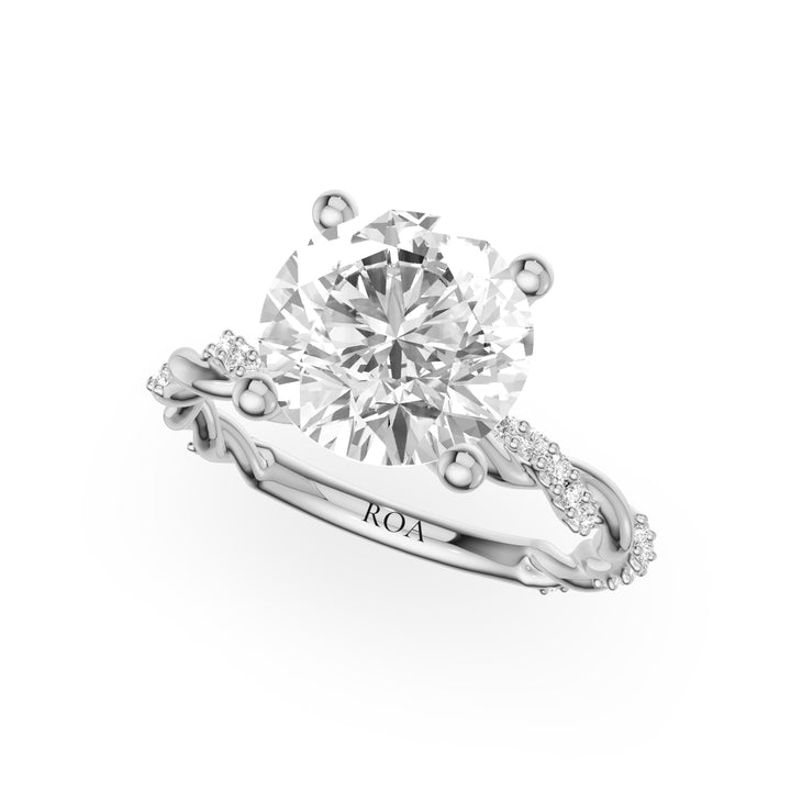 Refined Twisted Single Pave Engagement Ring in Round White Gold