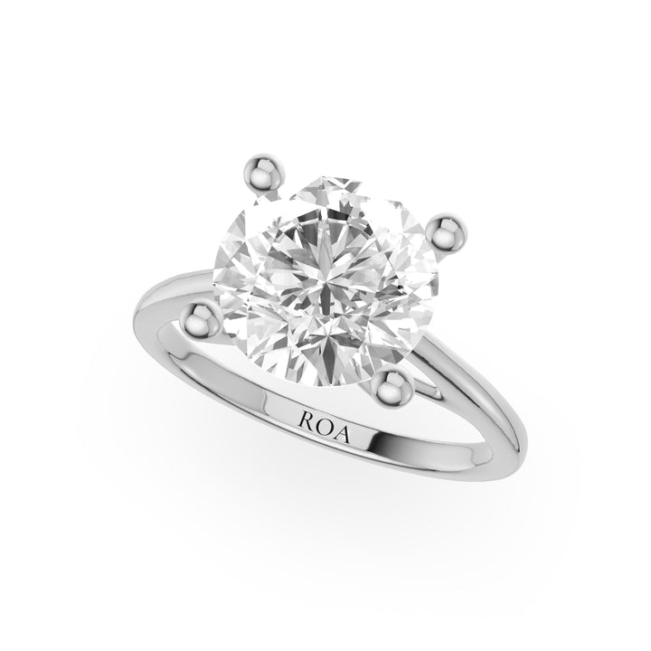 Snapdragon Tapered Shank Solitaire Engagement Ring in Round White Gold